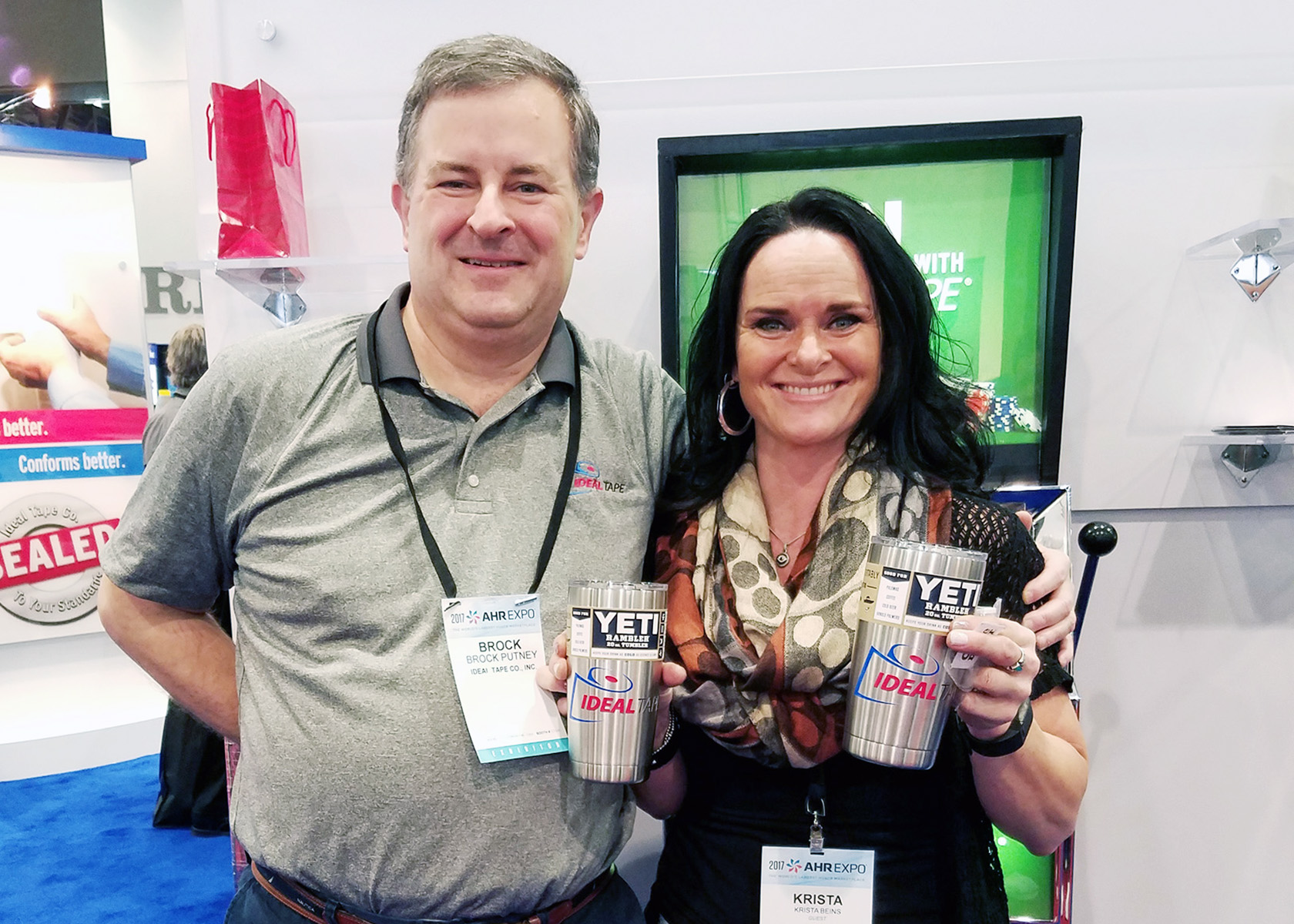 Krista Beins of Rocky Mountain Boiler, Inc. in Idaho Falls, ID walked away with two YETI 20 oz. Tumblers on Day 3 of the AHR Expo. (Pictured: Brock Putney, Krista Beins)