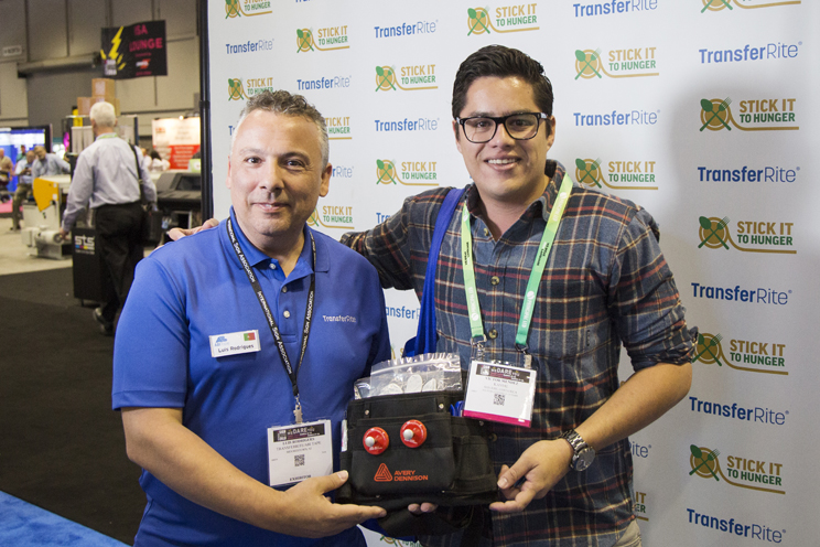 Victor Mendez of Kavial in San Jose, Costa Rica took home an Avery Tool Kit on Day 1 of the ISA Expo. (Pictured: Luis Rodrigues and Victor Mendez)