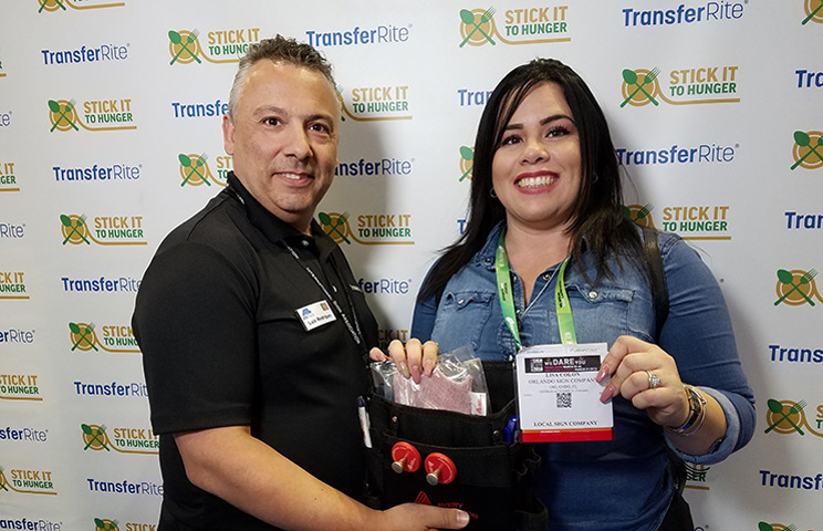 Lisa Colon of Orlando Sign Company in Orlando, Florida took home an Avery Tool Kit on Day 2 of the ISA Expo. (Pictured: Luis Rodrigues and Lisa Colon)