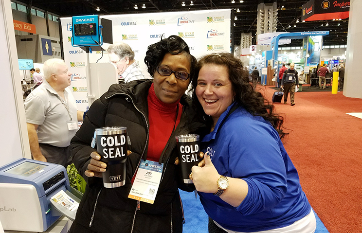 Joy Craig of Craig's Appliance Repair Services in Scarborough, Trinidad and Tobago took home two YETI tumblers on Day 3 of the AHR Expo. (Pictured: Joy Craig and Barbie Zarella)